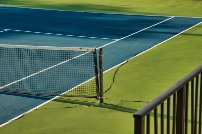 How Surface Cracks Impact Tennis Court Playability