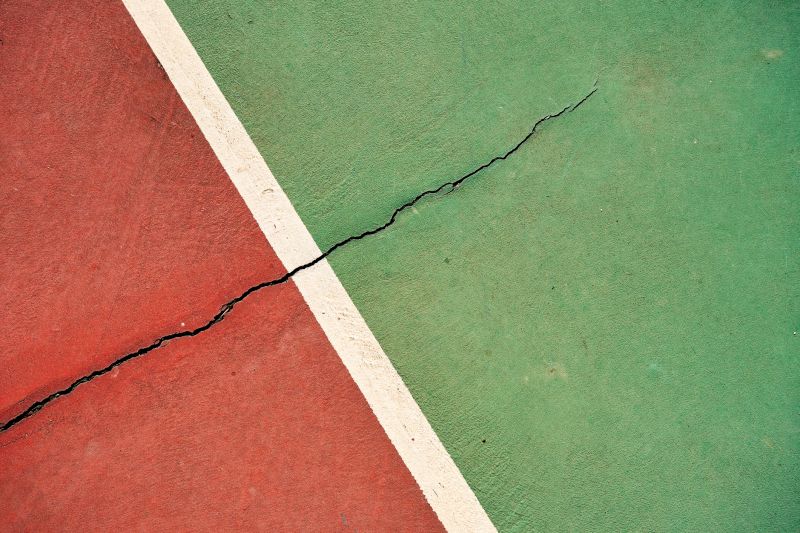 How Surface Cracks Impact Tennis Court Playability