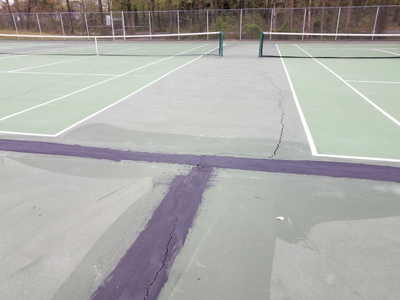 How Surface Cracks Impact Tennis Court Playability